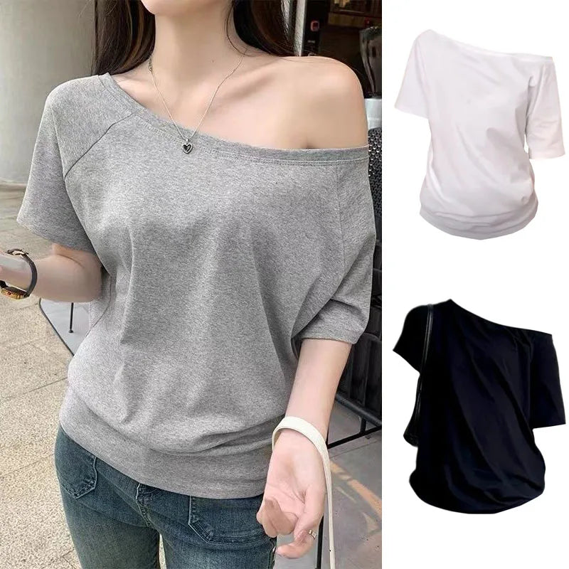 Damska asymetryczna koszulka z ukośnym kołnierzem – letni casualowy t-shirt